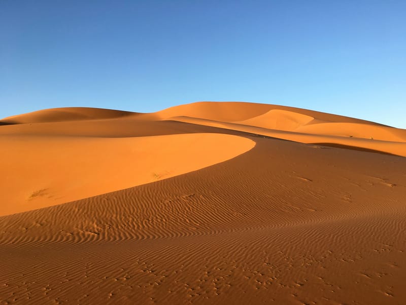 The rolling dunes of Erg Chebbi rise from the desert floor near Merzouga.
