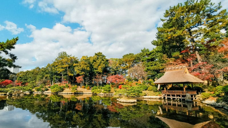 Shukkeien Garden in Hiroshima, with landscaped ponds, trees, and walking paths