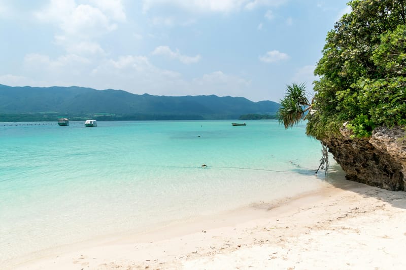 Kabira Bay on Ishigaki Island, where the water shifts from jade to turquoise with the tide.