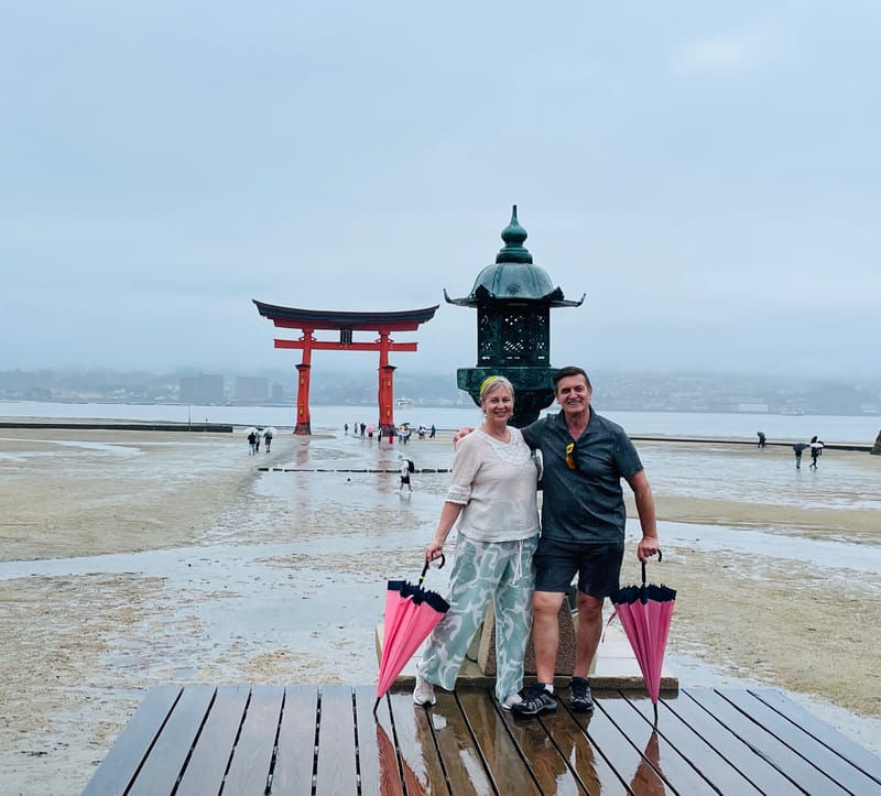 Sheralyn I and her travel partner enjoy the Miyajima Island stop despite the weather on their Authentic Japan tour