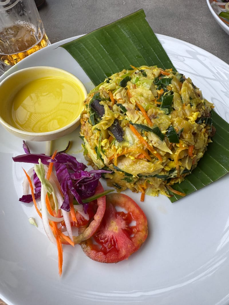 Sri Lankan kottu on a banana leaf with chopped roti and vegetables
