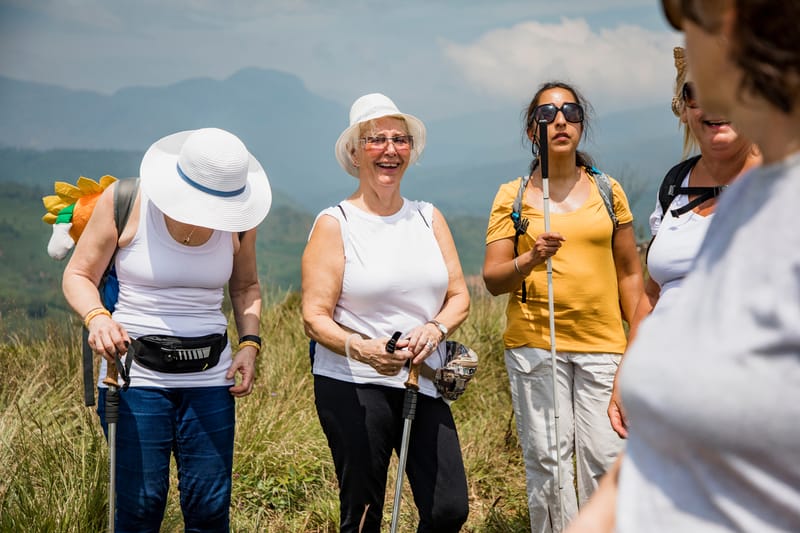 A group makes their way along a pilgrimage route, one of many walking journeys our Tailormade specialists can plan around your group's pace and tradition.