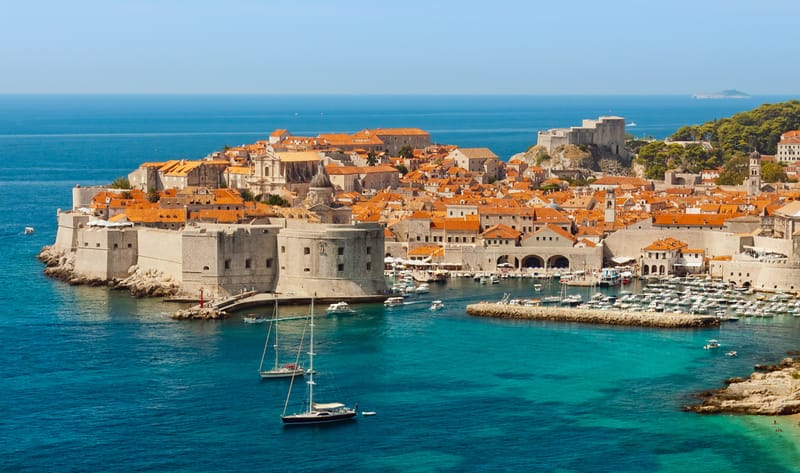 The Adriatic coastline in May, before peak-season prices and cruise ship crowds reach Croatia's harbour towns.