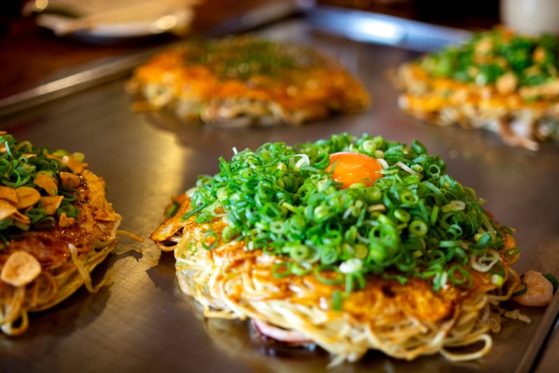 Be sure to try Hiroshima-style okonomiyaki on your Japan tour
