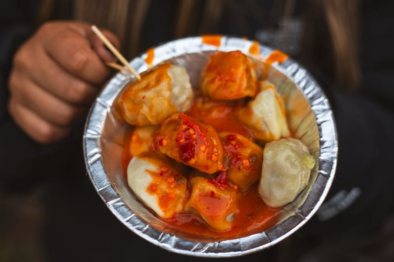 Nepalese momos (dumplings) with tomato achar.