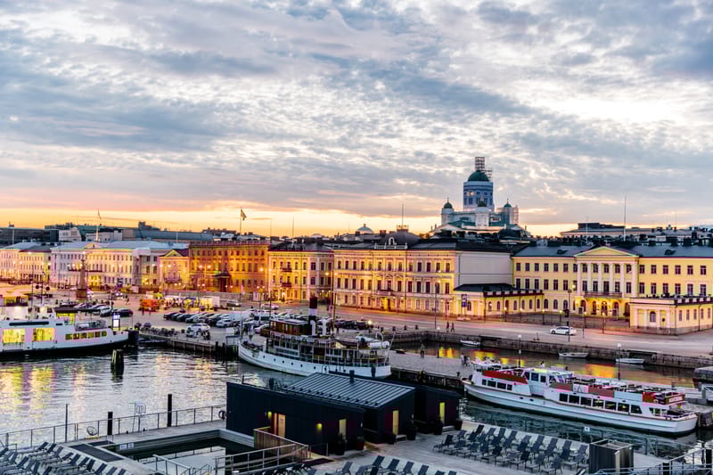 Helsinki&rsquo;s Market Square and Cathedral Glow at Sunset in This Sweeping Aerial View of the City