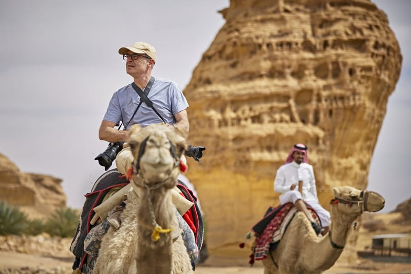 A camel ride through the desert rounds out a day of Saudi food and culture.